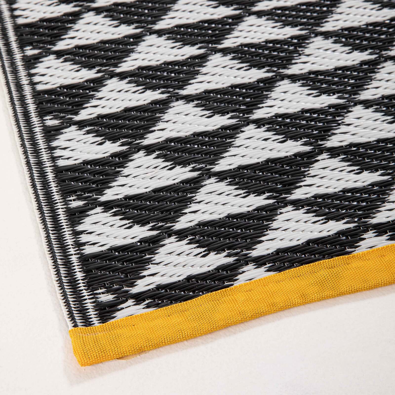 Tapete rectangular de exterior con diseños de doble cara en polipropileno