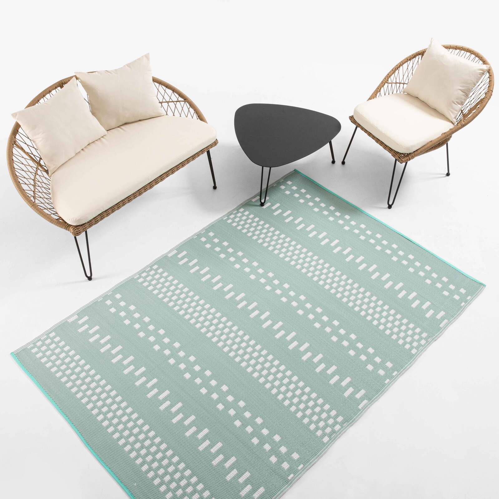 Alfombra rectangular de exterior con diseños de doble cara en polipropileno