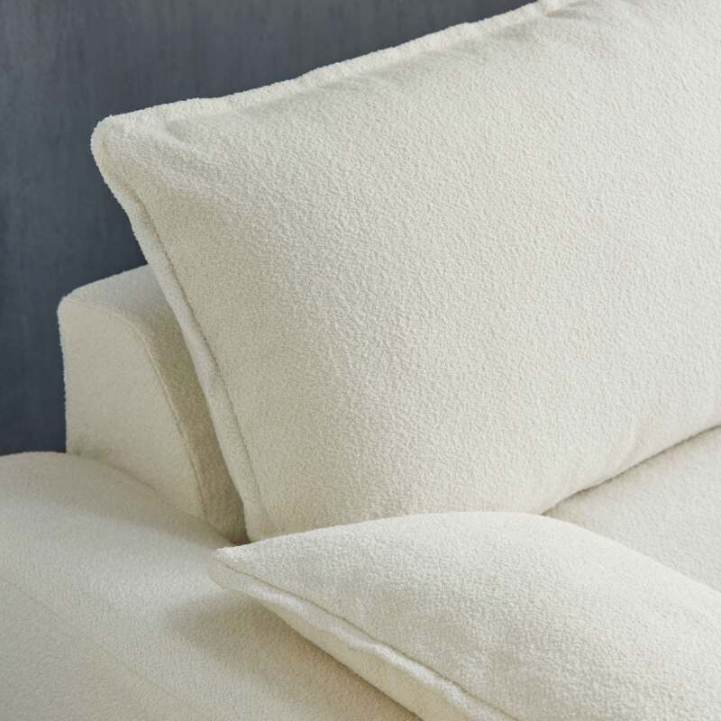 Sofá de tres plazas de tela de rizo