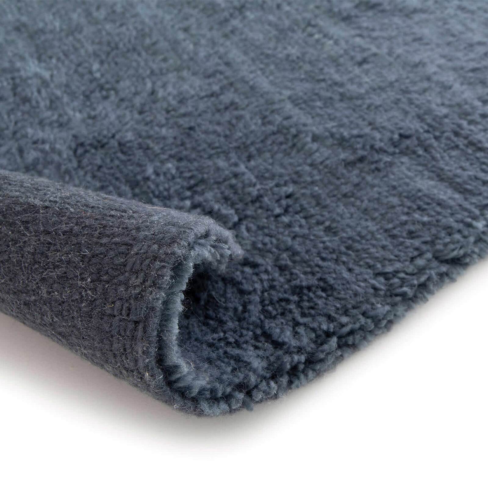 Alfombra rectangular de lana con diseño tejido a mano de pelo corto