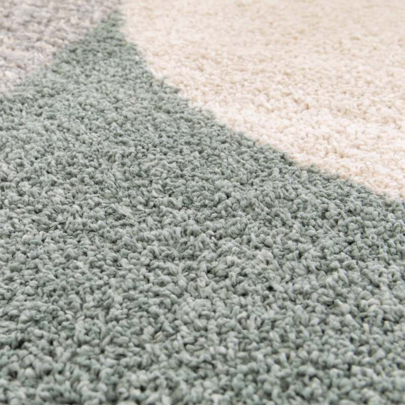 Tapete rectangular con diseño geométrico de pelo largo