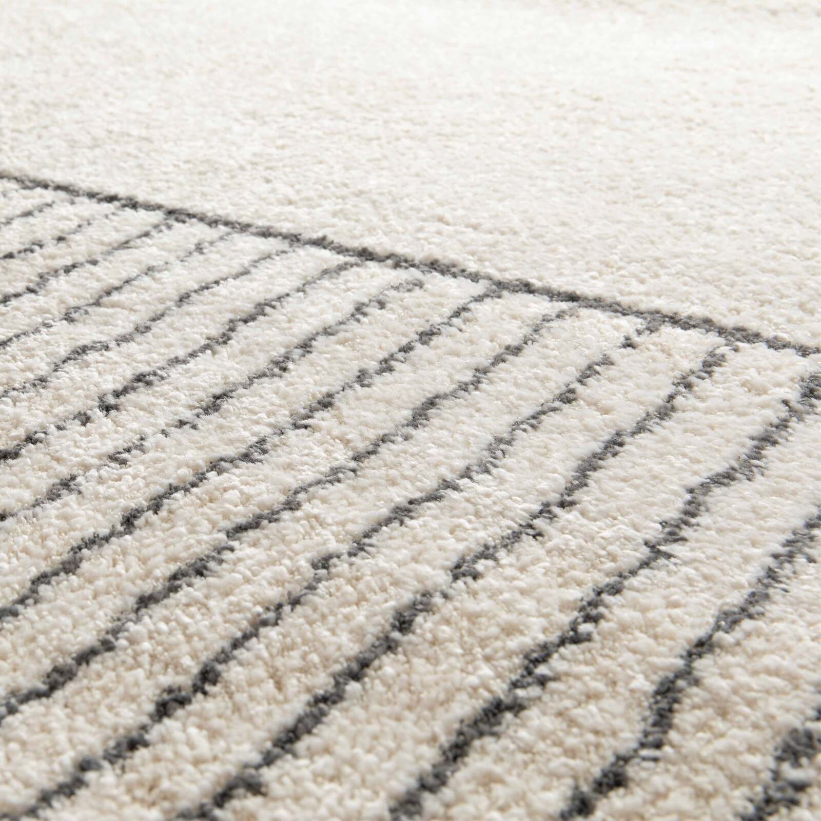 Alfombra rectangular con patrón lineal de pelo corto