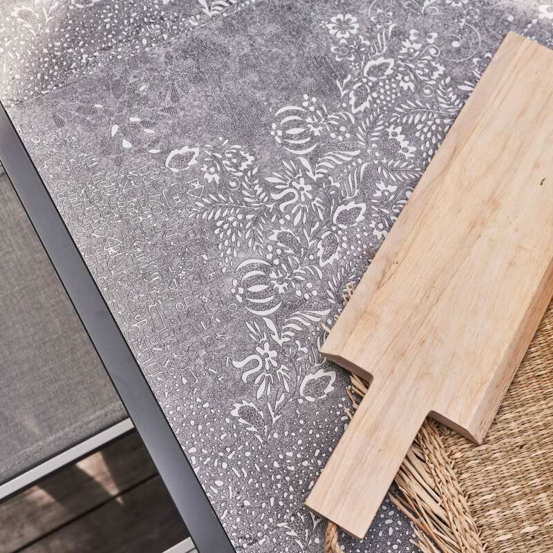 Mesa de jardín de cerámica con efecto estampado de 230 x 95 cm con 8 sillas y 2 sillas con reposabrazos