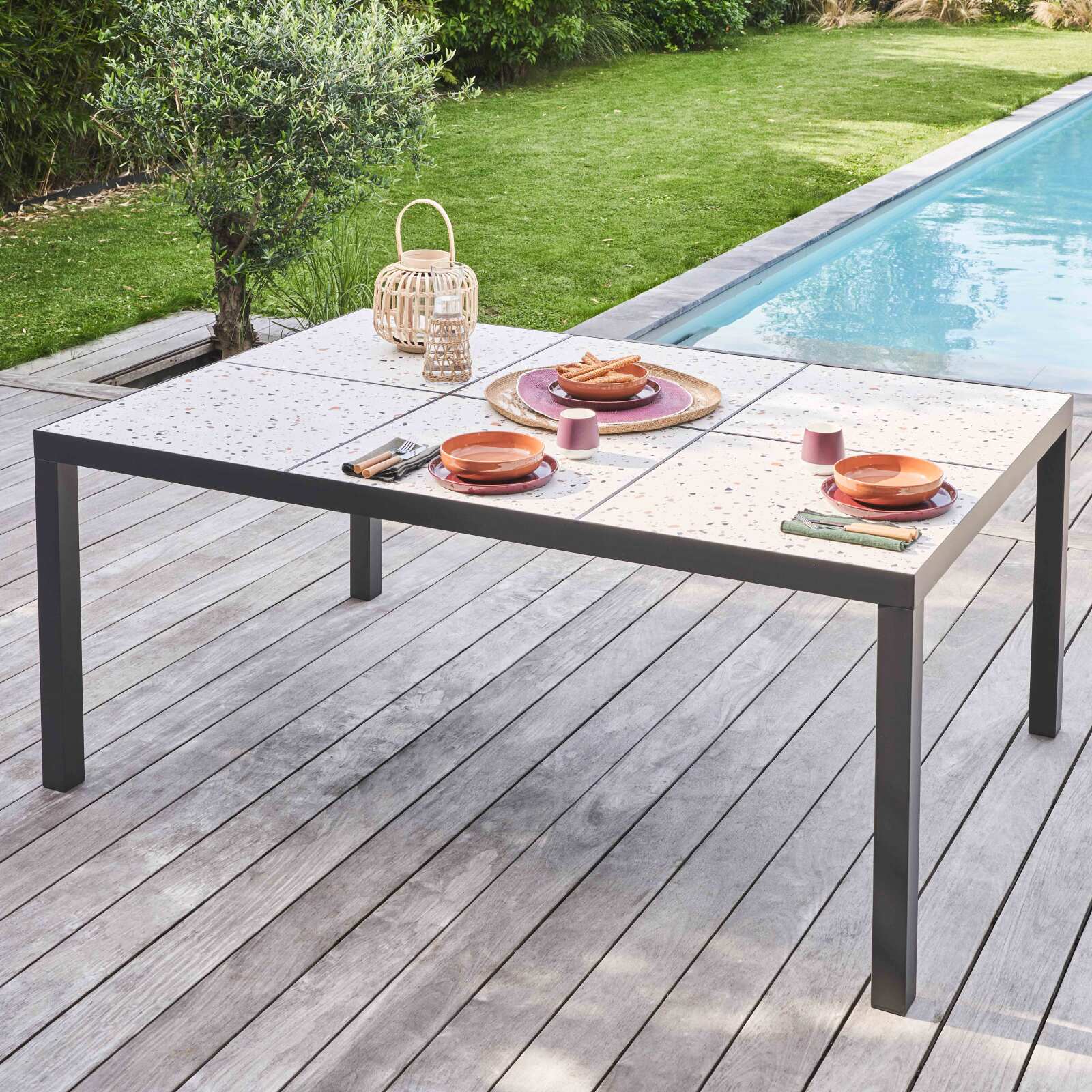 Mesa de jardín de cerámica con efecto terrazo de 182 x 121 cm con 10 sillas