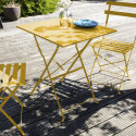 Mesa de jardin amarillo de metal