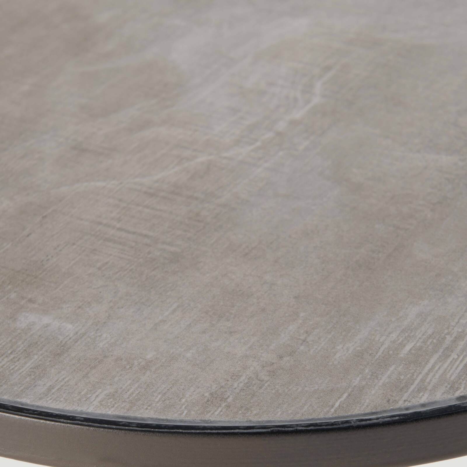 Mesa de centro redonda con tablero efecto hormigón