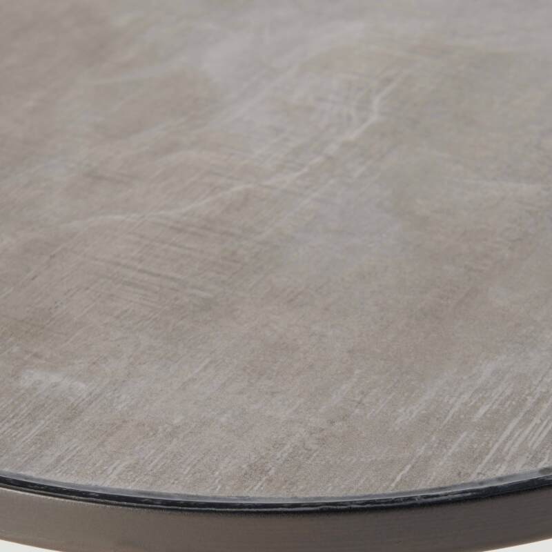 Mesa de centro redonda con tablero efecto hormigón