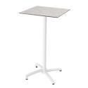 Mesa reclinable laminada de 60x60 cm de altura con pata blanca y sillas de metal