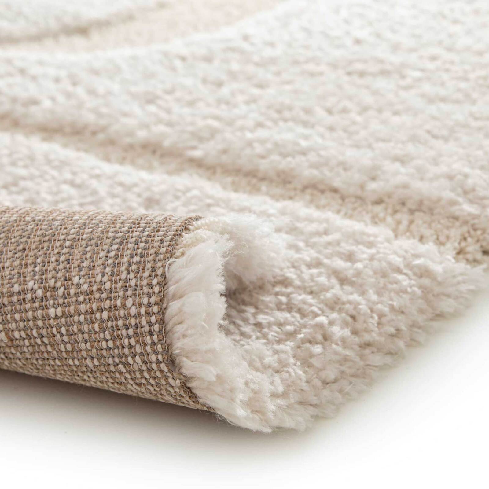 Alfombra shaggy rectangular de poliéster reciclado con motivos geométricos de pelo largo