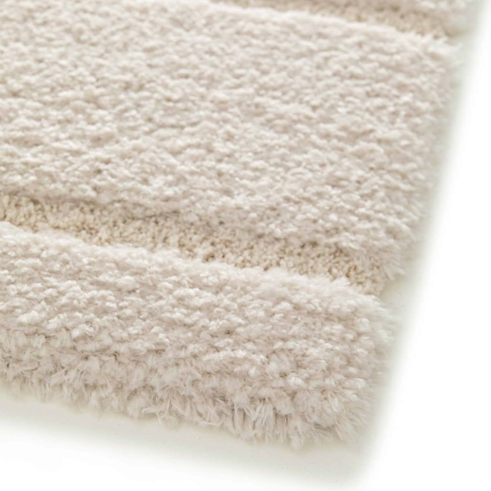 Alfombra shaggy rectangular de poliéster reciclado con motivos geométricos de pelo largo