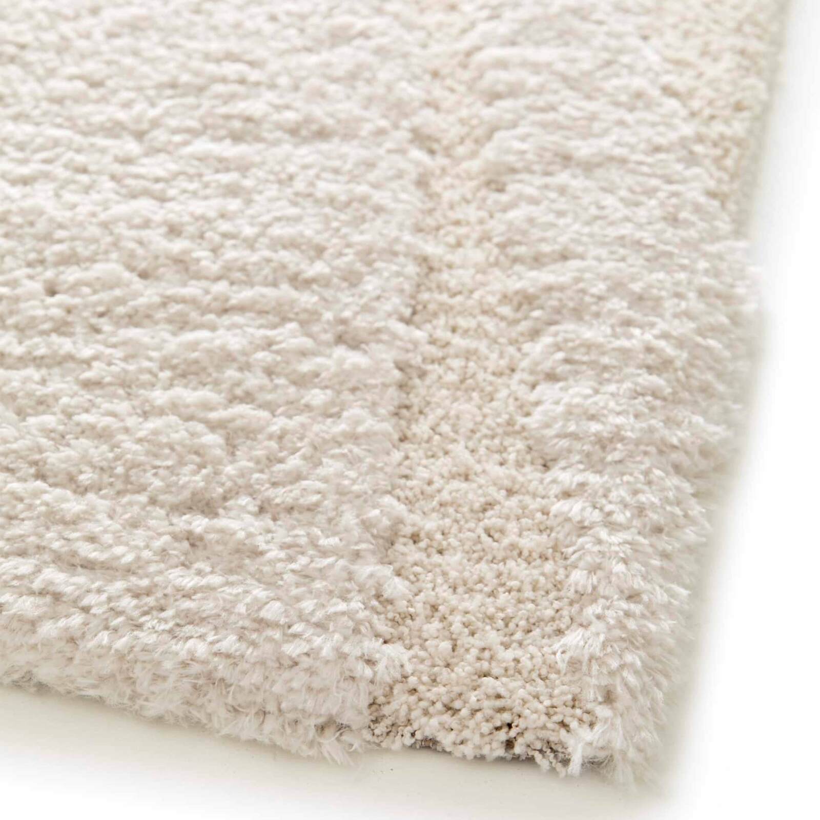 Alfombra shaggy rectangular de poliéster reciclado con motivos geométricos de pelo largo