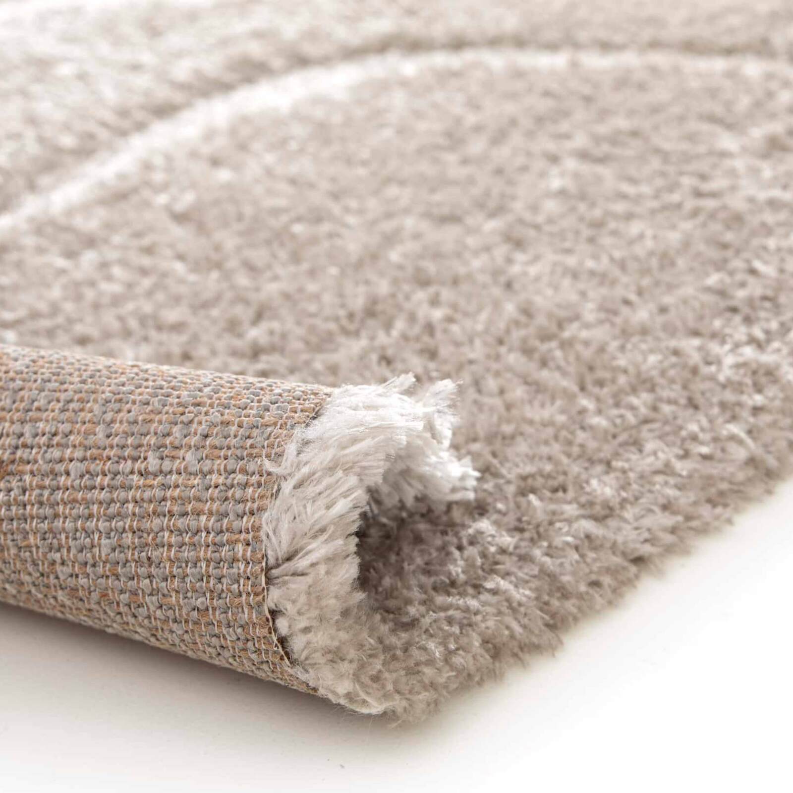 Alfombra shaggy rectangular de poliéster reciclado con motivos geométricos de pelo largo