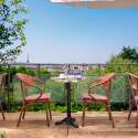 Mesa de terraza ⌀60 cm reclinable laminada y 2 sillas bistro en aluminio y ratán sintético