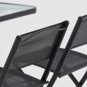 Mesa de jardín rectangular 130x80 cm y 4 sillas plegables