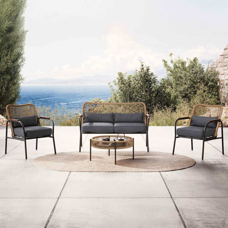 Mueble de jardín de ratán de 4 plazas con sofá, 2 sillones y mesa de centro.