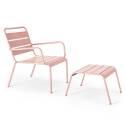 Sillón bajo y reposapiés de metal