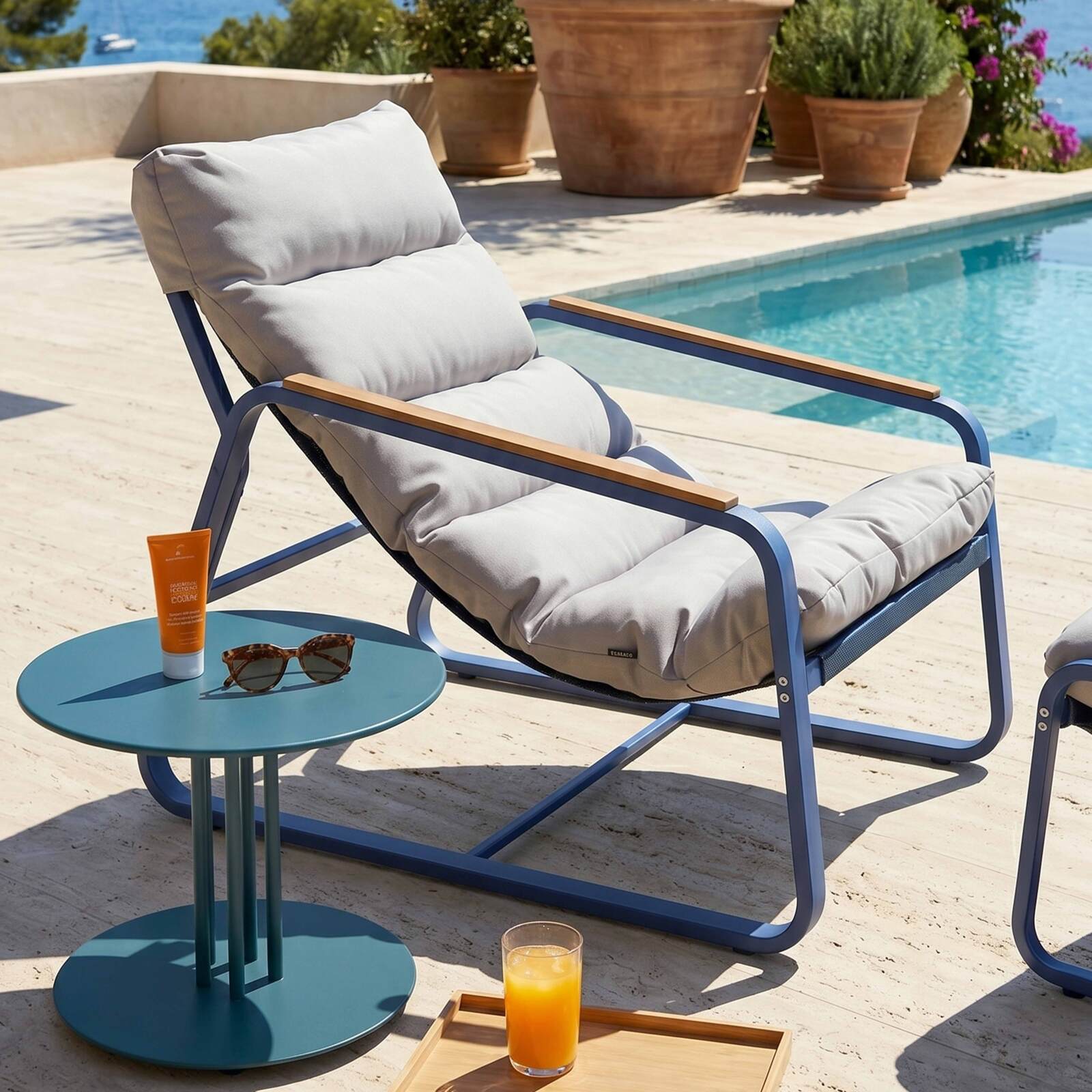 Sillón relax de jardín de metal y textilene con reposapiés