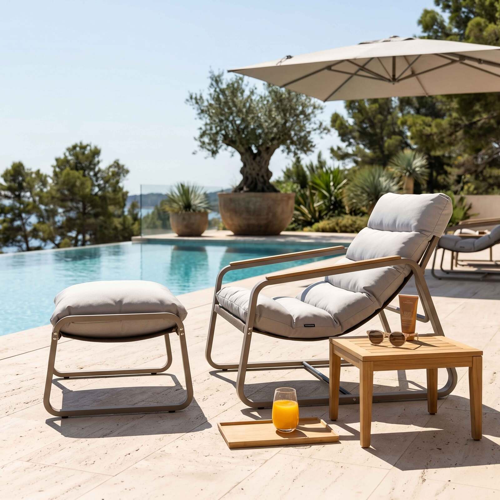 Sillón relax de jardín de metal y textilene con reposapiés