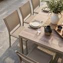 Mesa de jardín de aluminio y cerámica efecto madera 206x100 cm y 10 sillas en textilene