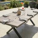Mesa de jardín extensible de aluminio y cerámica efecto madera 200/260x100 cm y 10 sillas de textilene