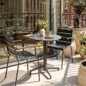 Mesa de jardín bistro redonda inclinable de metal con pie emprotado 70x70 cm y 2 sillas con reposabrazos