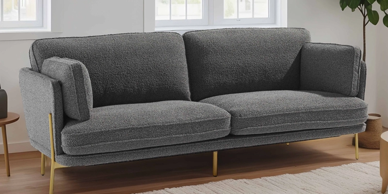 Sofá de tela bouclé